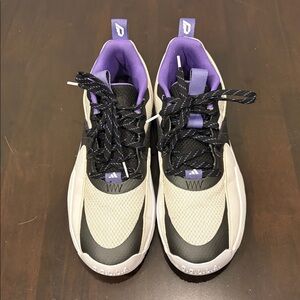 Adidas Dame’s in white and purple rush color way